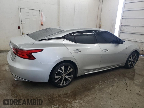 2016 Nissan Maxima SL with VIN 1N4AA6AP6GC446653, listed as a Copart auction lot 46621645 with 124,538 mi miles and Salvage Title. Bid and sale history available at DreamBid. Image 3.