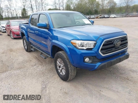 2018 Toyota Tacoma SR5 with VIN 3TMAZ5CNXJM069212, listed as a IAAI auction lot 42010564 with 73,825 mi miles and . Bid and sale history available at DreamBid. Image 1.