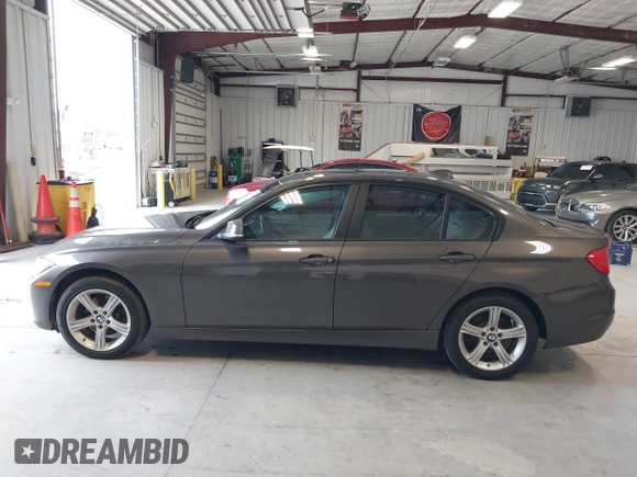 2015 BMW 3 Series 328i with VIN WBA3A5C57FF609734, listed as a IAAI auction lot 41392336 with 121,378 mi miles. Bid and sale history available at carsss.com. Image 14.