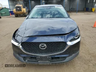 2022 Mazda CX-30 2.5 Turbo with VIN 3MVDMBAYXNM417439, listed as a Copart auction lot 57280884 with 13,590 mi miles and Salvage Title. Bid and sale history available at DreamBid. Image 5.