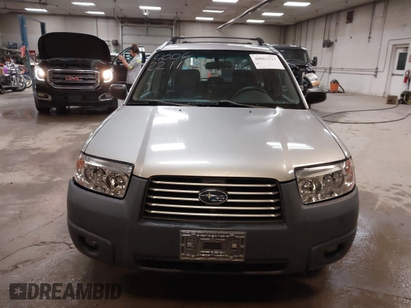 2006 Subaru Forester 2.5 X with VIN JF1SG636X6H712880, listed as a IAAI auction lot 40062211 with 127,537 mi miles. Bid and sale history available at carsss.com. Image 12.