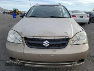 2007 Suzuki Forenza z VIN KL5JD86Z97K720530, wystawiony jako Copart lot #85948614 z przebiegiem 158 174 mil mil oraz Szkody całkowita. Historia ofert i sprzedaży dostępna na DreamBid. Obrazek 5.