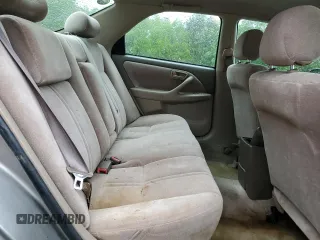 1998 Toyota Camry LE z VIN 4T1BG22K9WU300292, wystawiony jako Copart lot #52169985 z przebiegiem 247 137 mil mil oraz Szkoda całkowita • Salvage title. Historia ofert i sprzedaży dostępna na DreamBid. Obrazek 10.