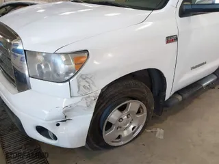 2008 Toyota Tundra LTD with VIN 5TBEV58198S476301, listed as a IAAI auction lot 41528085 with 230,233 mi miles. Bid and sale history available at carsss.com. Image 12.