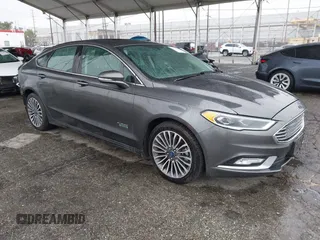 2017 Ford Fusion Titanium with VIN 3FA6P0SU8HR329570, listed as a IAAI auction lot 41773023 with 112,022 mi miles and . Bid and sale history available at carsss.com. Image 1.