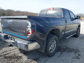 2016 Toyota Tundra 4WD Truck SR with VIN 5TFUW5F19GX548996, listed as a IAAI auction lot 41607605 with 101,194 mi miles. Bid and sale history available at carsss.com. Image 4.