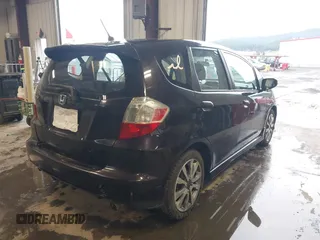 2013 Honda Fit Sport with VIN JHMGE8H59DC012780, listed as a IAAI auction lot 41929195 with 135,959 mi miles. Bid and sale history available at carsss.com. Image 4.