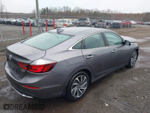 2020 Honda Insight Touring with VIN 19XZE4F98LE011149, listed as a IAAI auction lot 41834043 with 54,251 mi miles and . Bid and sale history available at carsss.com. Image 4.
