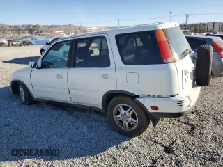 2000 Honda CR-V SE z VIN JHLRD1876YS019786, wystawiony jako Copart lot #88793865 z przebiegiem 168 507 mil mil oraz Szkoda całkowita • Salvage title. Historia ofert i sprzedaży dostępna na DreamBid. Obrazek 2.