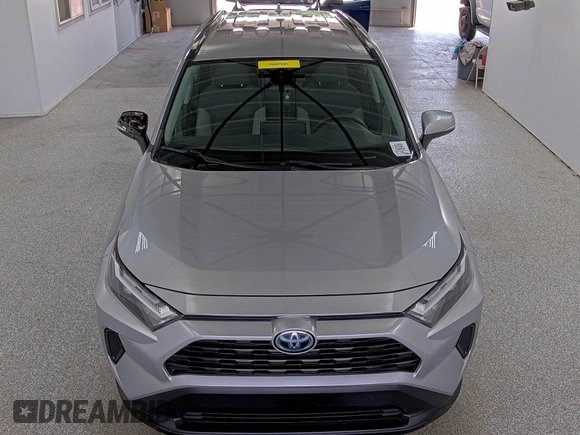 2023 Toyota RAV4 Hybrid XLE with VIN 2T3RWRFV9PW175446, listed as a IAAI auction lot 42806880 with 90,261 mi miles and . Bid and sale history available at DreamBid. Image 12.