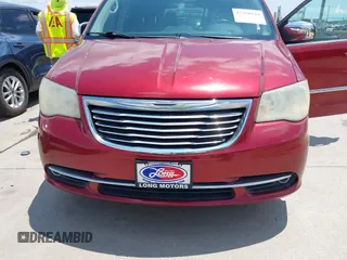 2014 Chrysler Town & Country Touring L 30th Anniversary z VIN 2C4RC1CG5ER215108, wystawiony jako IAAI lot #42358529 z przebiegiem 151 248 mil mil oraz . Historia ofert i sprzedaży dostępna na DreamBid. Obrazek 6.
