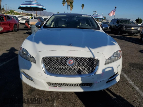 2014 Jaguar XJ with VIN SAJWA2GZ7E8V66626, listed as a Copart auction lot 78824254 with 132,720 mi miles and Salvage Title. Bid and sale history available at carsss.com. Image 5.