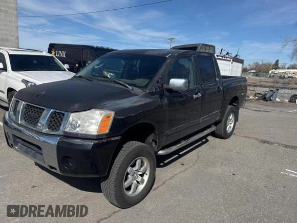 2004 Nissan Titan LE with VIN 1N6AA07A84N590583, listed as a Copart auction lot 49112705 with 92,426 mi miles and Salvage Title. Bid and sale history available at DreamBid. Image 2.