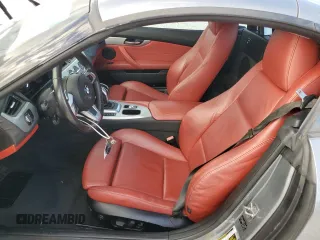 2011 BMW Z4 sDrive35i with VIN WBALM7C55BE382692, listed as a Copart auction lot 84460034 with 112,322 mi miles and Salvage Title. Bid and sale history available at carsss.com. Image 7.