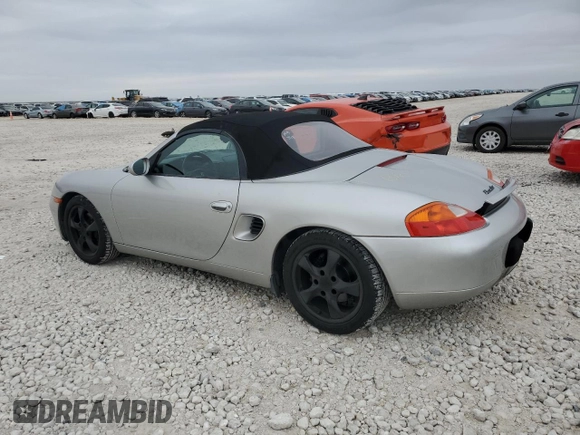 2001 Porsche Boxster с VIN WP0CA29821U621779, выставлен на аукционе Copart как лот 87204984 с пробегом 82 091 миль миль и Списание • Salvage title. История ставок и продаж доступна на DreamBid. Изображение 2.