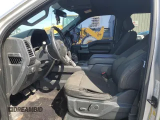 2015 Ford F-150 XLT с VIN 1FTEW1EF1FKE33685, выставлен на аукционе Copart как лот 57180675 с пробегом Не указан миль и Списание • Salvage title. История ставок и продаж доступна на DreamBid. Изображение 7.