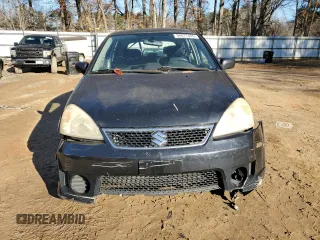 2006 Suzuki Aerio Premium z VIN JS2RC62HX65351200, wystawiony jako Copart lot #88077405 z przebiegiem 165 431 mil mil oraz Szkoda całkowita • Salvage title. Historia ofert i sprzedaży dostępna na DreamBid. Obrazek 5.