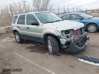 2003 Ford Escape XLT Popular 2 with VIN 1FMYU93183KB80977, listed as a IAAI auction lot 41657209 with 1 mi miles. Bid and sale history available at carsss.com. Image 1.