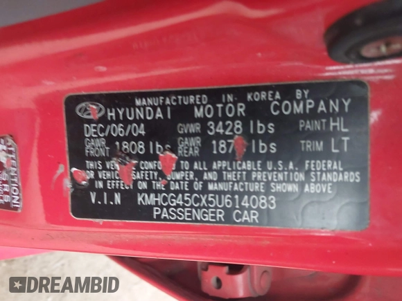 2005 Hyundai Accent GLS with VIN KMHCG45CX5U614083, listed as a IAAI auction lot 41006582 with 72,516 mi miles. Bid and sale history available at carsss.com. Image 9.