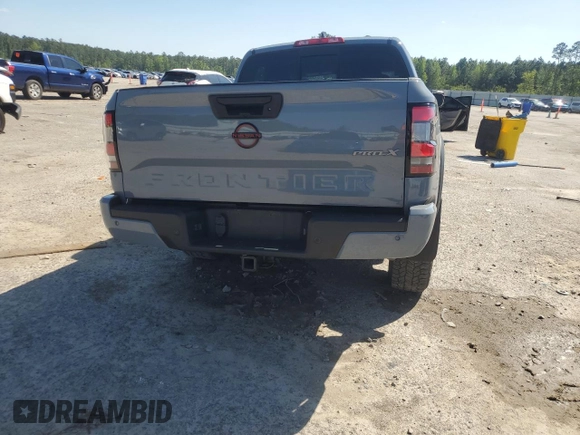 2022 Nissan Frontier Pro-X с VIN 1N6ED1EJ5NN679157, выставлен на аукционе Copart как лот 51935295 с пробегом 38 648 миль миль и Списание • Salvage title. История ставок и продаж доступна на DreamBid. Изображение 6.