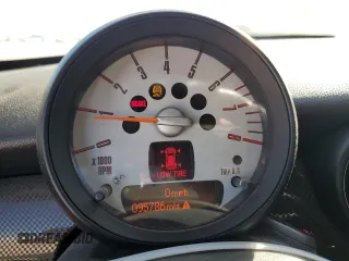 2012 MINI Coupe S z VIN WMWSX3C56CT408371, wystawiony jako Copart lot #73730514 z przebiegiem 95 786 mil mil oraz Szkody całkowita. Historia ofert i sprzedaży dostępna na DreamBid. Obrazek 9.
