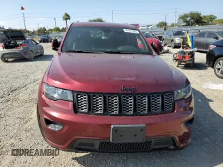 2020 Jeep Grand Cherokee Laredo E with VIN 1C4RJEAG2LC379633, listed as a Copart auction lot 58437555 with 57,219 mi miles and Salvage title. Bid and sale history available at DreamBid. Image 5.