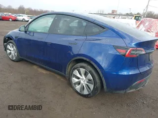 2023 Tesla Model Y Long Range z VIN 7SAYGDEE2PF694974, wystawiony jako IAAI lot #41814582 z przebiegiem 31 726 mil mil oraz . Historia ofert i sprzedaży dostępna na DreamBid. Obrazek 3.