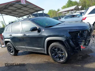 2022 Jeep Cherokee Trailhawk with VIN 1C4PJMBX1ND533715, listed as a IAAI auction lot 42041057 with 65,487 mi miles and . Bid and sale history available at DreamBid. Image 14.