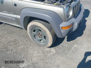 2003 Jeep Liberty Sport z VIN 1J4GL48K73W671700, wystawiony jako IAAI lot #42222189 z przebiegiem 237 970 mil mil oraz . Historia ofert i sprzedaży dostępna na DreamBid. Obrazek 6.