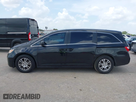 2011 Honda Odyssey EX-L с VIN 5FNRL5H61BB021707, выставлен на аукционе IAAI как лот 42544835 с пробегом 199 002 миль миль и . История ставок и продаж доступна на DreamBid. Изображение 14.