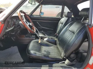 1979 FIAT 124 Spider z VIN 124CS20142625, wystawiony jako Copart lot #63245354 z przebiegiem 41 509 mil mil oraz Tytuł czysty. Historia ofert i sprzedaży dostępna na DreamBid. Obrazek 7.
