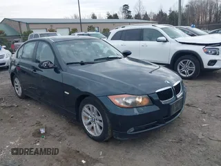 2006 BMW 3 Series 325xi with VIN WBAVD13516KT79513, listed as a IAAI auction lot 41609704 with 116,883 mi miles. Bid and sale history available at carsss.com. Image 1.
