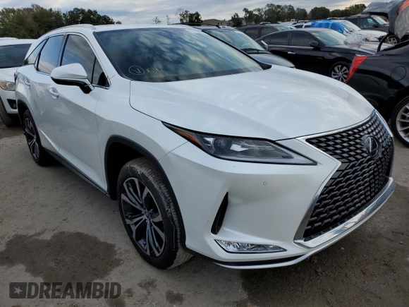 2022 Lexus RX with VIN JTJHZKEA5N2027824, listed as a Copart auction lot 71738562 with 5,100 mi miles. Bid and sale history available at carsss.com. Image 4.