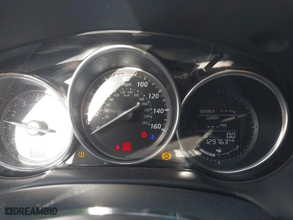 2014 Mazda CX-5 Grand Touring with VIN JM3KE2DY1E0380423, listed as a IAAI auction lot 41854206 with 129,763 mi miles. Bid and sale history available at carsss.com. Image 7.