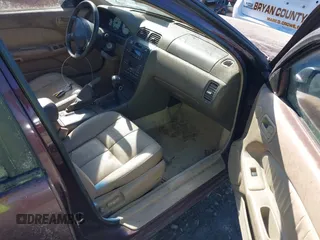 1998 Nissan Maxima GXE z VIN JN1CA21A0WT402950, wystawiony jako IAAI lot #41825084 z przebiegiem 244 042 mil mil oraz . Historia ofert i sprzedaży dostępna na DreamBid. Obrazek 5.