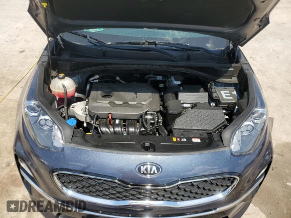 2022 Kia Sportage EX с VIN KNDPN3AC5N7978311, выставлен на аукционе Copart как лот 50744325 с пробегом 87 063 миль миль и Списание • Salvage title. История ставок и продаж доступна на DreamBid. Изображение 14.