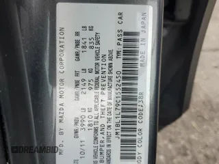 2012 Mazda 3 i Touring with VIN JM1BL1L79C1552450, listed as a Copart auction lot 56544455 with 107,737 mi miles and Salvage title. Bid and sale history available at DreamBid. Image 12.