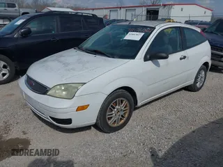 2007 Ford Focus S with VIN 1FAFP31N77W201442, listed as a IAAI auction lot 41887827 with 137,001 mi miles and . Bid and sale history available at carsss.com. Image 2.