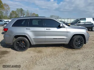 2018 Jeep Grand Cherokee Laredo E with VIN 1C4RJFAG0JC284927, listed as a IAAI auction lot 41964013 with 130,145 mi miles. Bid and sale history available at carsss.com. Image 13.
