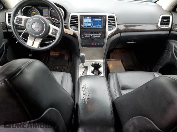 2011 Jeep Grand Cherokee Laredo z VIN 1J4RR4GG2BC662746, wystawiony jako Copart lot #53989845 z przebiegiem 138 402 mil mil oraz Szkoda całkowita • Salvage title. Historia ofert i sprzedaży dostępna na DreamBid. Obrazek 8.