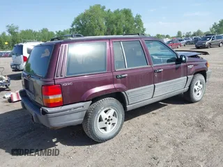 1994 Jeep Grand Cherokee Laredo with VIN 1J4GZ58Y2RC112641, listed as a IAAI auction lot 42212705 with 160,762 mi miles and . Bid and sale history available at DreamBid. Image 4.