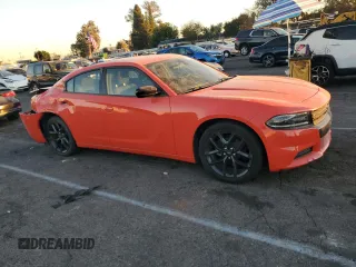 2021 Dodge Charger SXT with VIN 2C3CDXBG5MH533942, listed as a Copart auction lot 85306964 with 64,682 mi miles and Salvage Title. Bid and sale history available at carsss.com. Image 4.