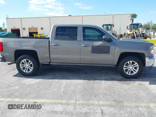 2017 Chevrolet Silverado 1500 LT with VIN 3GCPCREC1HG380406, listed as a IAAI auction lot 42031974 with 128,444 mi miles. Bid and sale history available at carsss.com. Image 13.