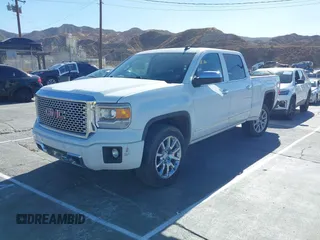 2014 GMC Sierra 1500 Denali z VIN 3GTU2WEJ2EG349289, wystawiony jako IAAI lot #41313698 z przebiegiem 190 441 mil mil oraz . Historia ofert i sprzedaży dostępna na DreamBid. Obrazek 19.
