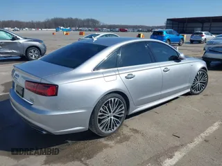 2018 Audi A6 Prestige with VIN WAUH3AFC9JN047482, listed as a IAAI auction lot 41763615 with 69,678 mi miles and . Bid and sale history available at DreamBid. Image 4.