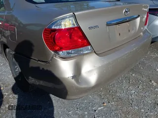 2006 Toyota Camry LE z VIN 4T1BF32K16U118594, wystawiony jako IAAI lot #41558030 z przebiegiem 275 360 mil mil oraz . Historia ofert i sprzedaży dostępna na DreamBid. Obrazek 6.