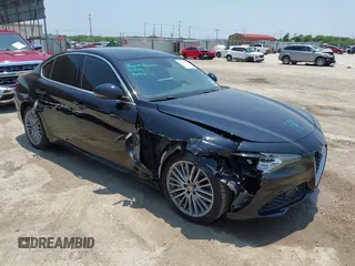 2018 Alfa Romeo Giulia Ti Sport with VIN ZARFAEEN9J7576371, listed as a IAAI auction lot 42348292 with 63,701 mi miles and . Bid and sale history available at DreamBid. Image 1.