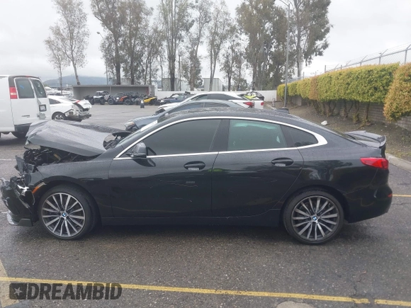 2021 BMW 2 Series 228i with VIN WBA53AK02M7H50951, listed as a IAAI auction lot 41791778 with 30,809 mi miles and . Bid and sale history available at DreamBid. Image 14.