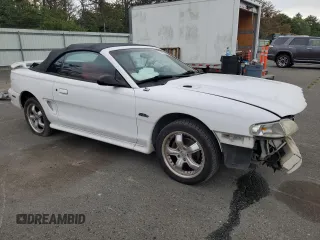 1996 Ford Mustang GT with VIN 1FALP45X9TF225224, listed as a Copart auction lot 66895564 with 113,282 mi miles and Salvage Title. Bid and sale history available at carsss.com. Image 4.