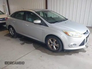 2012 Ford Focus SE z VIN 1FAHP3F25CL224401, wystawiony jako IAAI lot #42787863 z przebiegiem 183 285 mil mil oraz . Historia ofert i sprzedaży dostępna na DreamBid. Obrazek 1.